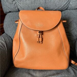 Kate Spade Orange Backpack with Textured Leather and Metal Clasp